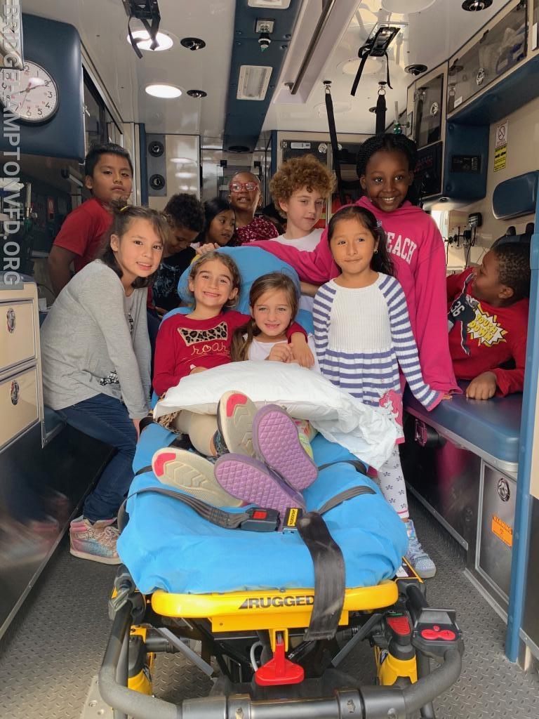 Bridgehampton School students explore the inside the Ambulance. 